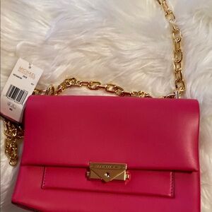 Michael Kors Cece Medium Shoulder Bag in Electric pink.